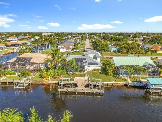 Aerial view of residential area with a large body of water