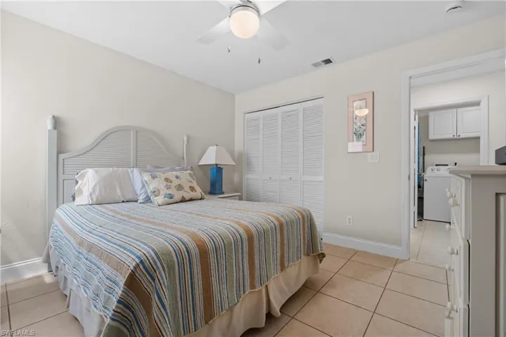 Neutral-toned interior with tile flooring throughout