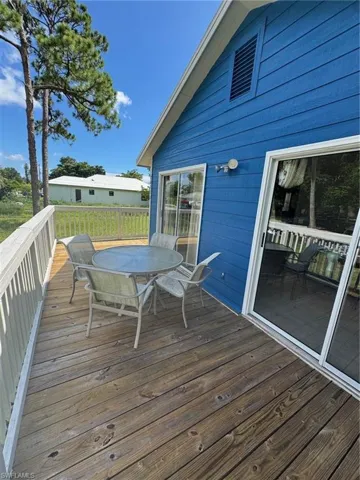 Wooden terrace with outdoor dining space