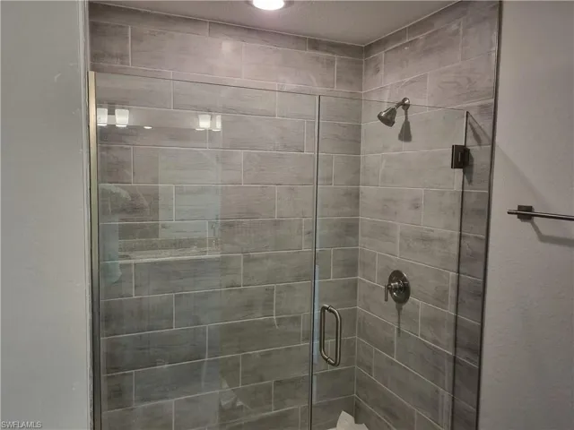 Bathroom with a stall shower
