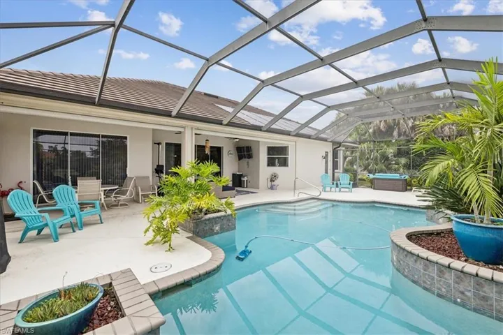View of pool featuring a patio and a lanai