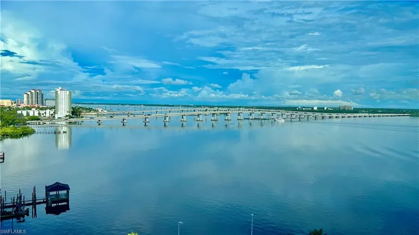 Property view of water featuring a boat dock