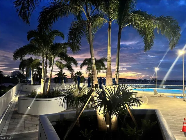 View of pool at dusk