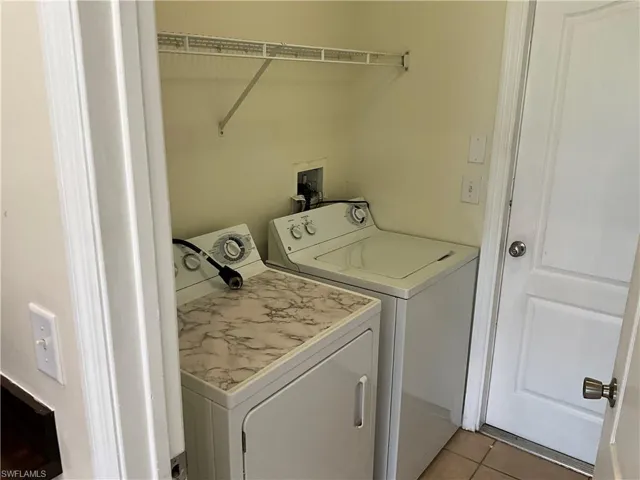 Laundry room featuring washing machine and dryer