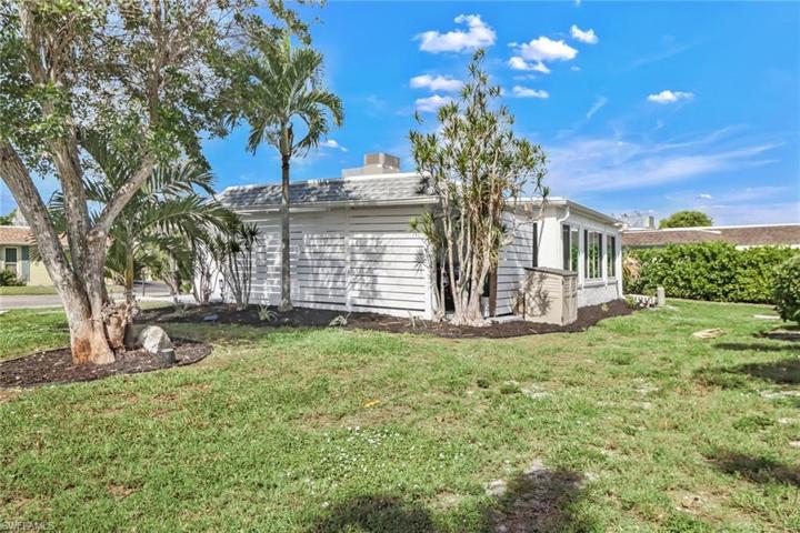 Enclosed private carport with lights and fan