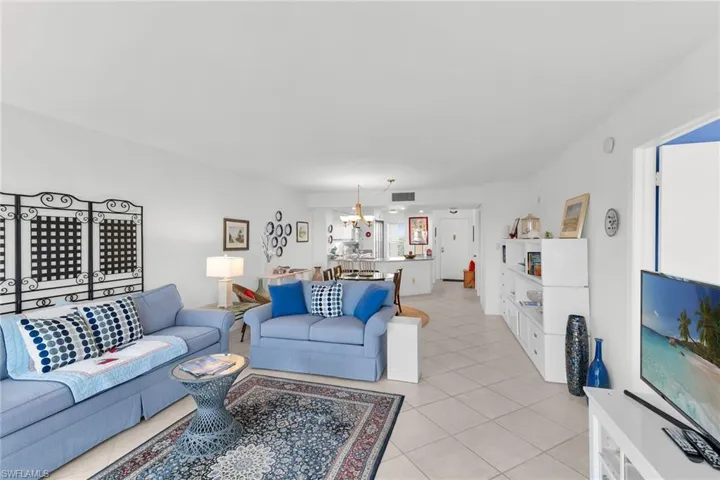 Living room featuring light tile patterned flooring
