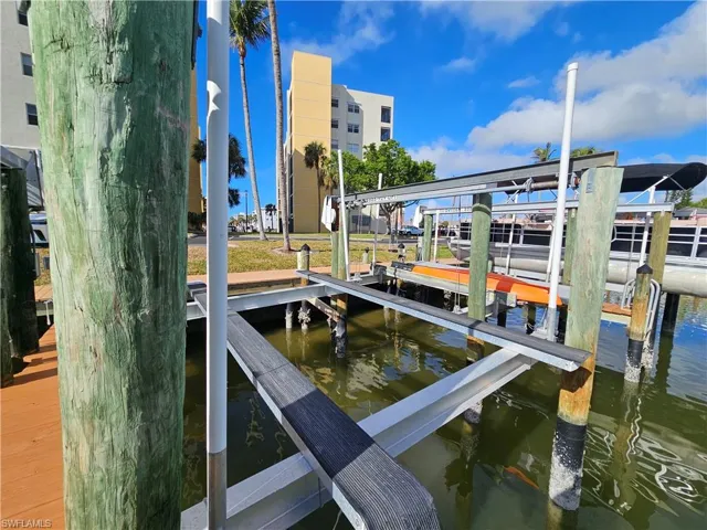 View of dock with a water view