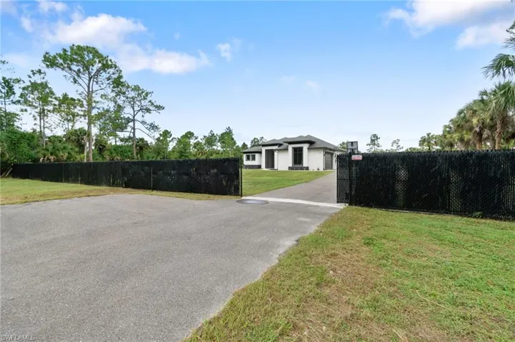 Privacy fence with solar gate