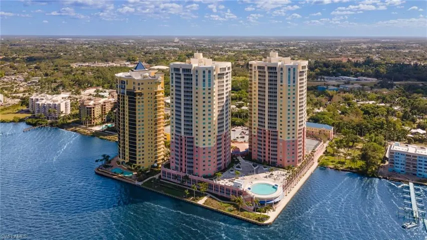 Waterfront high-rise complex featuring multiple towers with extensive water frontage