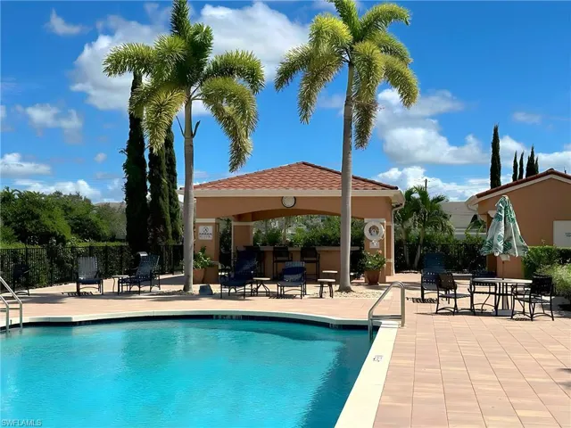 View of swimming pool with a gazebo and a patio area