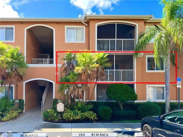 View of front of home with a balcony