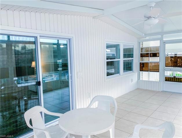 Rear Lanai with screens, acrylic windows, and electric