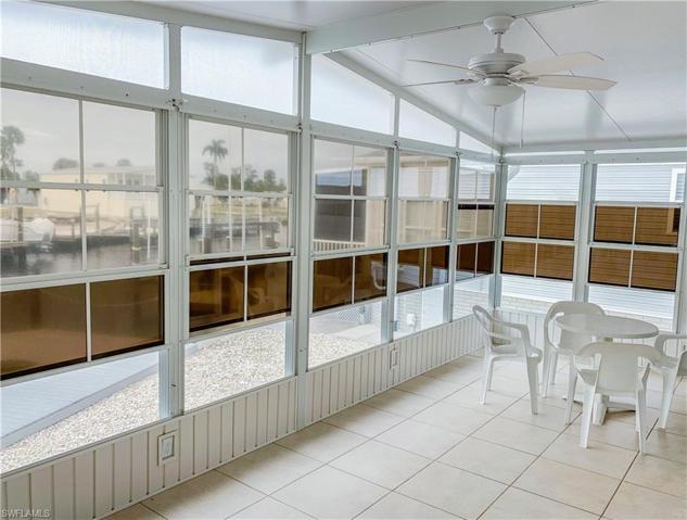 Rear Lanai with screens, acrylic windows, and electric