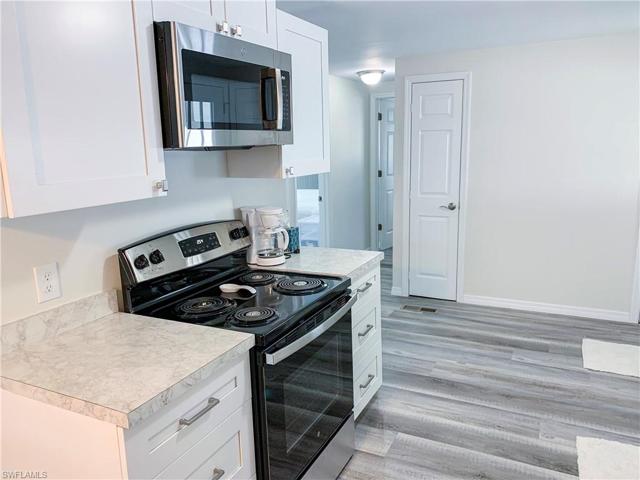 Kitchen looking toward entrance and hall