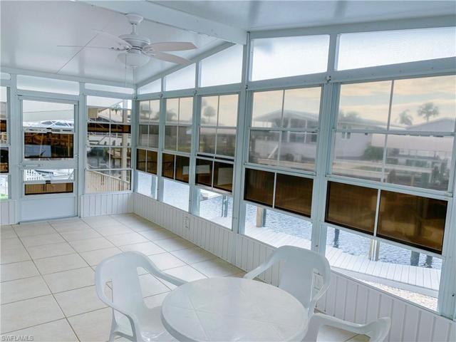 Rear Lanai with screens, acrylic windows, and electric