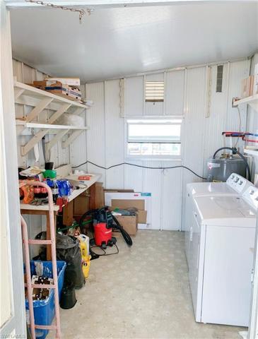 Storage shed  and laundry off carport