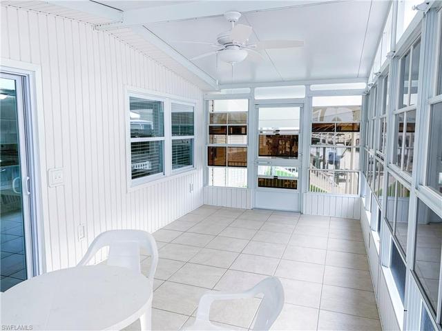 Rear Lanai with screens, acrylic windows, and electric