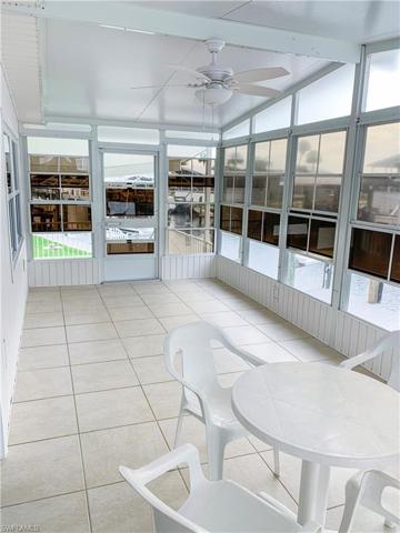 Rear Lanai with screens, acrylic windows, and electric