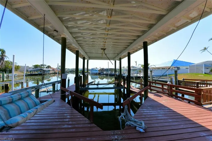 Inside of LARGE covered Dock and lift for large  or small boat