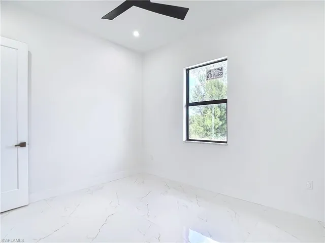 Unfurnished room with ceiling fan