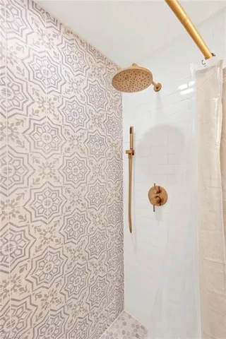 Bathroom featuring a shower stall