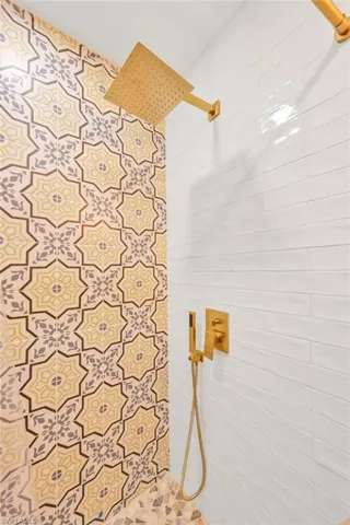 Full bathroom with a tile shower