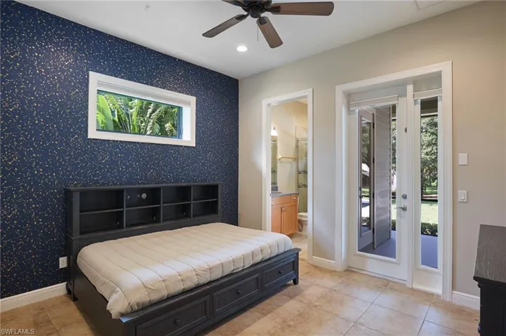 Bedroom featuring ceiling fan%2