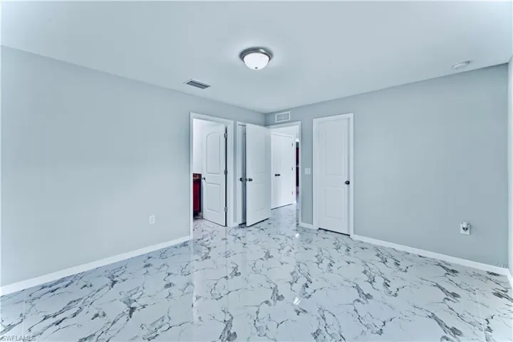 View of tiled spare room
