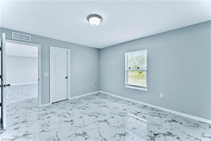 View of tiled spare room