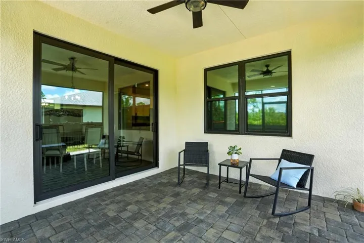 View of patio / terrace with ceiling fan