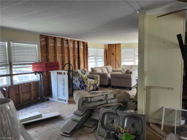 Living room featuring plenty of natural light and a textured ceiling