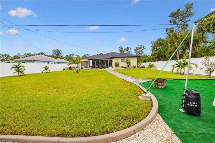 View of fenced backyard