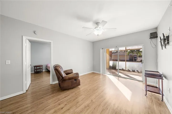 Unfurnished room with light wood-style flooring and a ceiling fan