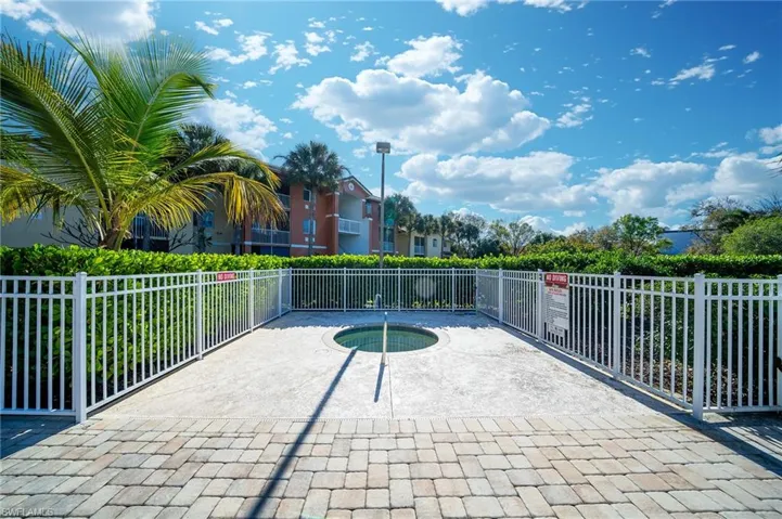 View of patio / terrace featuring a hot tub