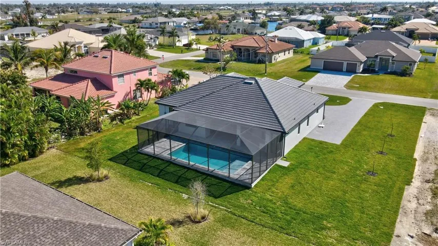 Aerial view of residential area with a pool area