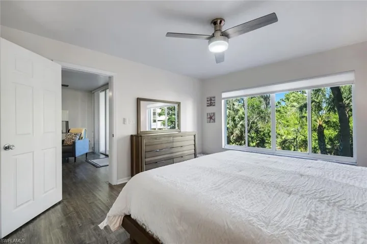 Bedroom featuring wood-finish flooring and a contemporary ceiling fan