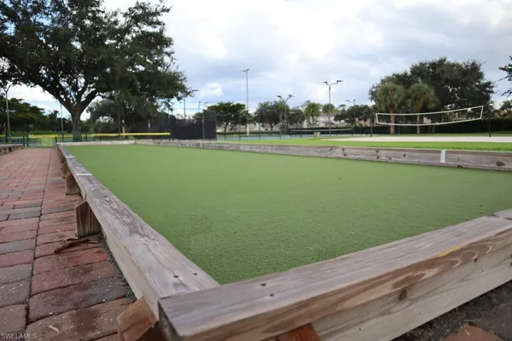 View of property's community featuring a bocce ball area and volleyball court