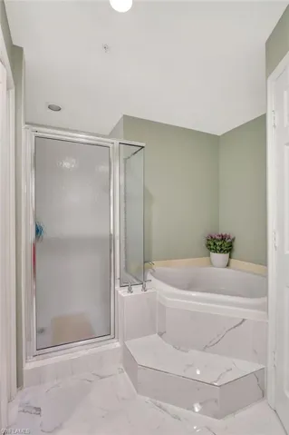 Bathroom with independent shower and bath