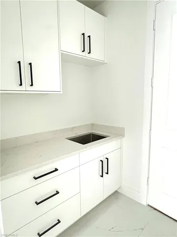 Laundry room with custom cabinets