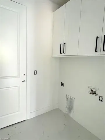 Laundry room with custom cabinets