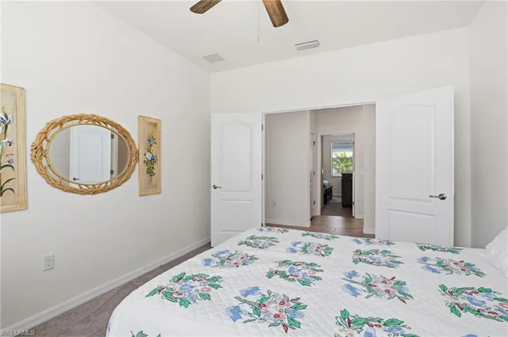 Den set up as a 4th bedroom with queen sized bed