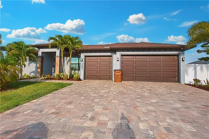 Ranch-style home with a garage