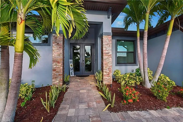 Entrance to property featuring french doors