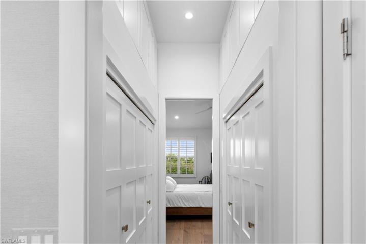 Primary Bedroom Closets with extra storage above