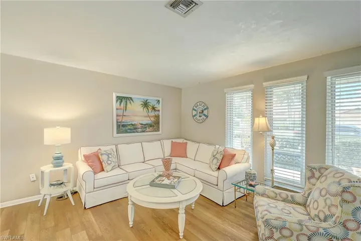 Living area featuring wood finished floors and baseboards