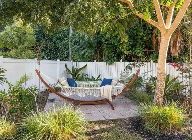 Fenced backyard featuring a patio area