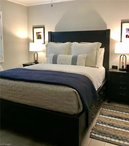 Bedroom featuring ornamental molding