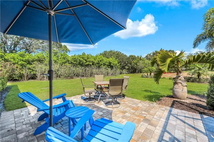 Very private yard with lush rear views.  Professional landscape lighting for evening enjoyment.