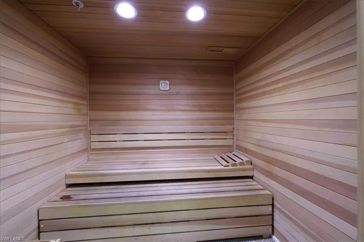 Relaxing sauna / steam room with wood ceiling