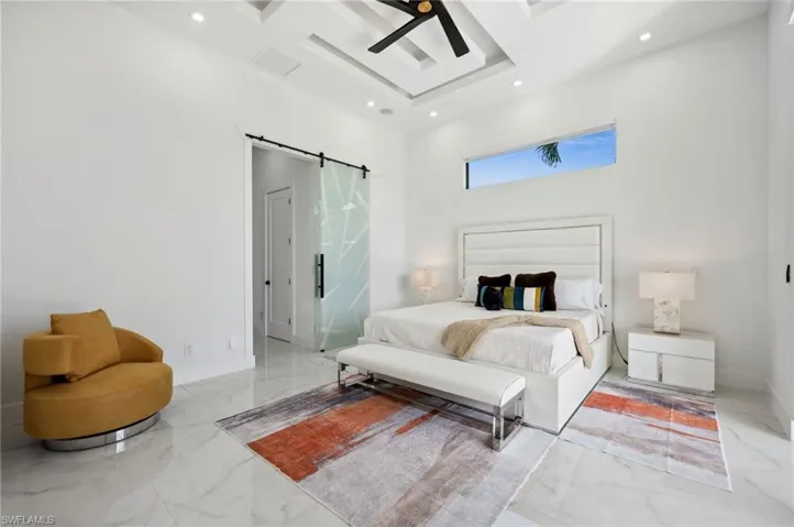 Master Bedroom with Glass Sliding Barn Door to rest of Master Suite